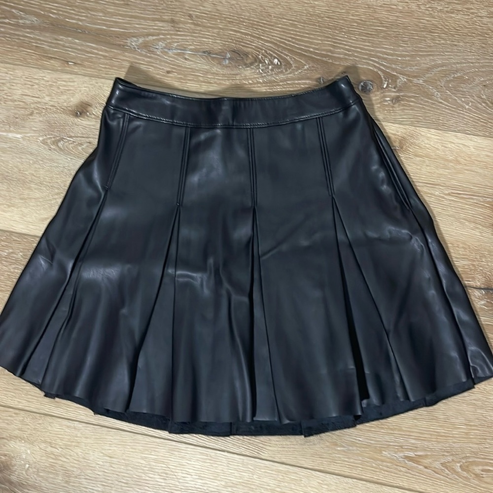 Black faux leather pleated skirt